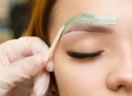 workshop,wax,depilation,of,eyebrow,hair,in,women,,eyebrow,correction.