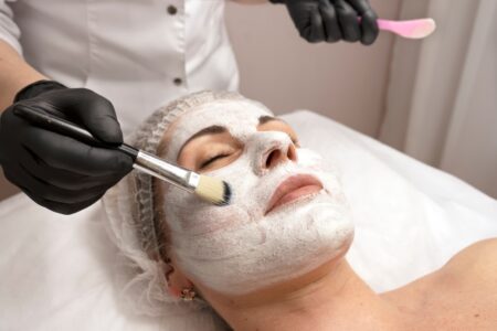 moisturizing,rejuvenation,facial,peeling,mask.,medicine,and,cosmetology.,beautician's,hands